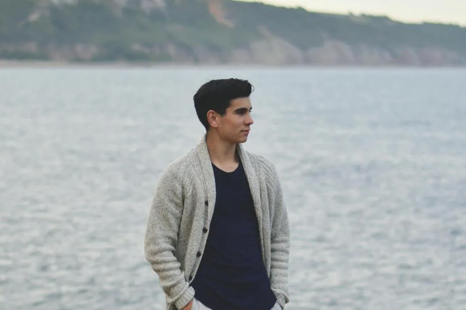 Student by water