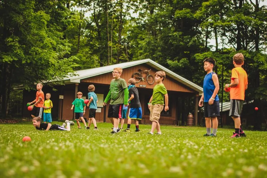 campers playing a game on the lawn