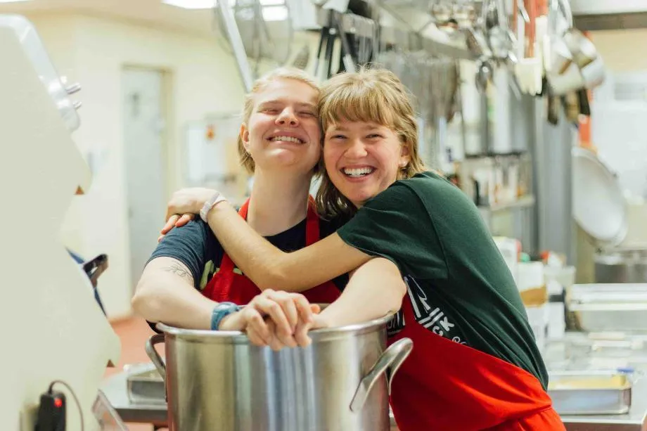 sisters working in the kitchen