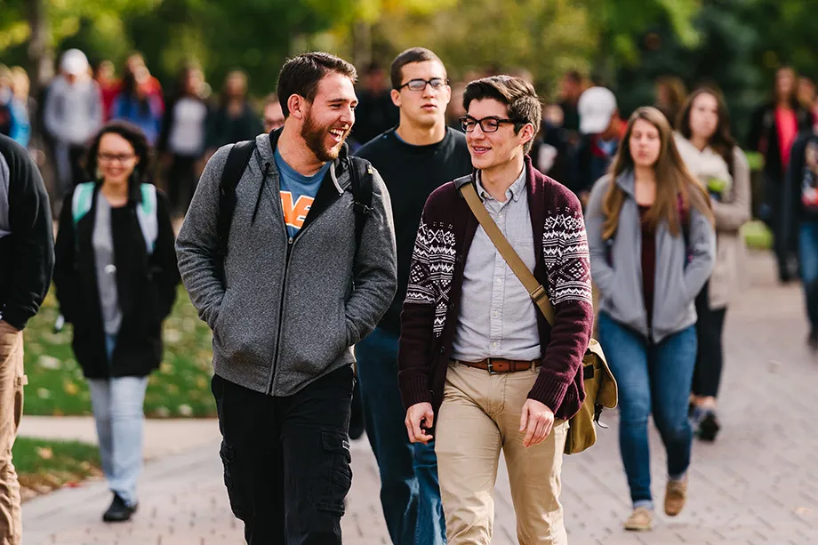 920x613 happy students walking fall
