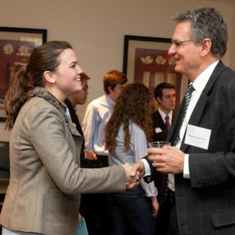 Business and Economics student networking with a Wheaton College alumni