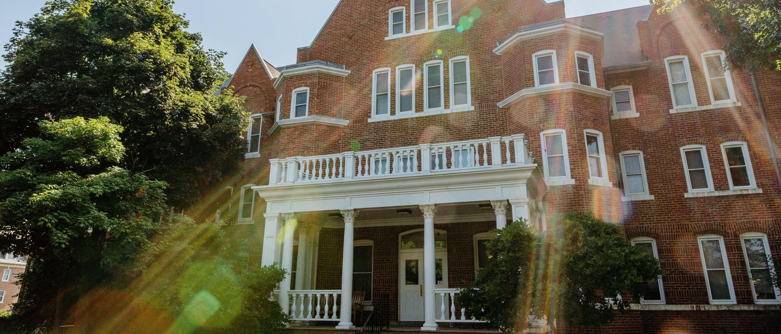 Williston Hall with sunbeams
