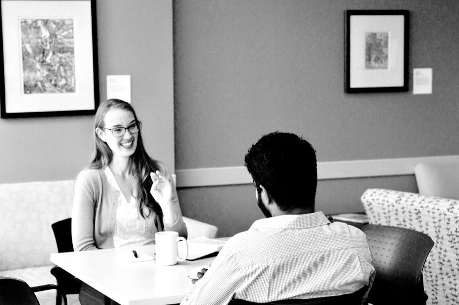 Two people sitting at a table