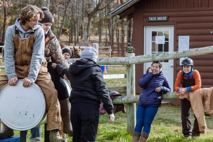 students learning in horsemanship class