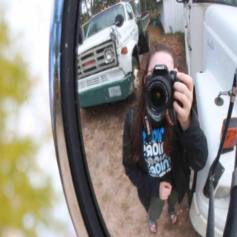 meg wolfe takes photo in Ops Truck mirror