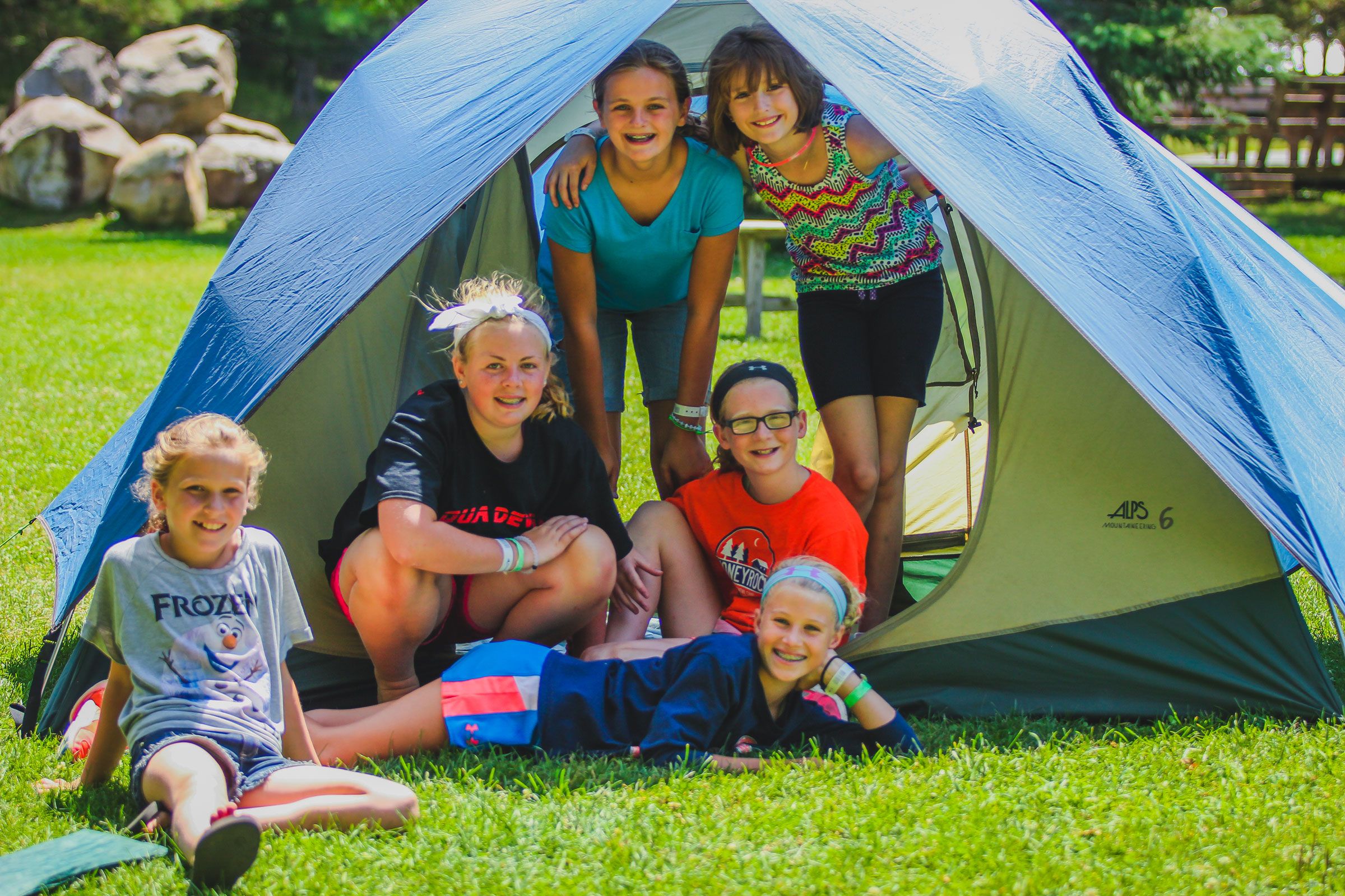 These campers set up their own tent! We equip all campers with the gear they need to go on their camp out or wilderness trip and teach them how to use it.