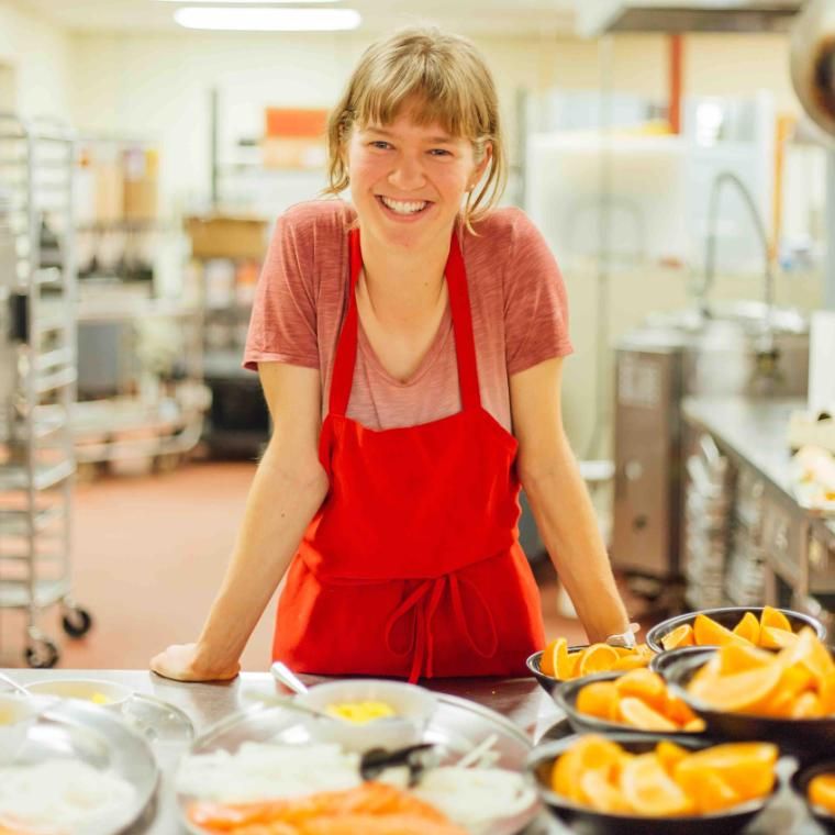 vanguard sarah lambert serving oranges and smiling