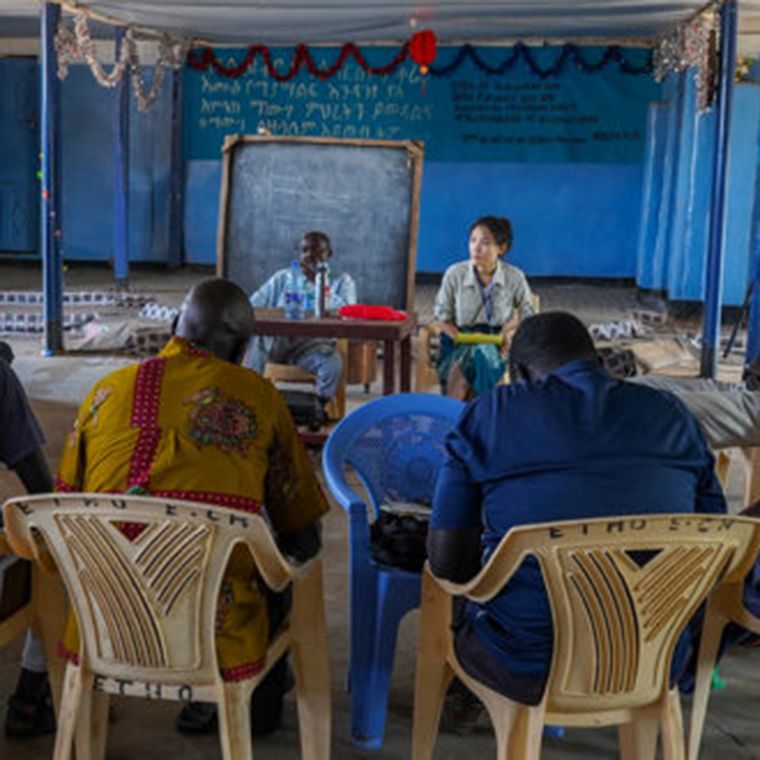 People discussing in a meeting