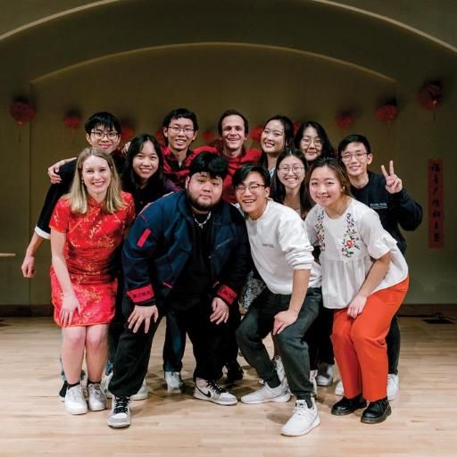 Wheaton College IL Student performers pose for a photo after the Lunar New Year celebration in Coray Gym
