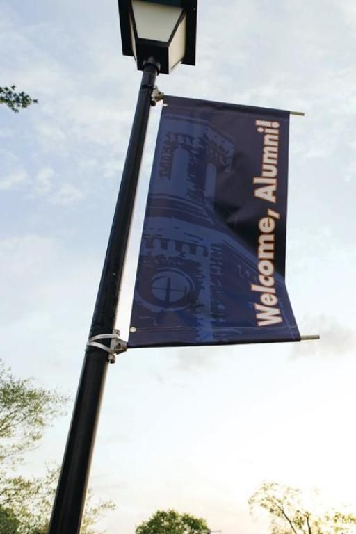 Banner welcoming alumni to Wheaton College reunion weekend