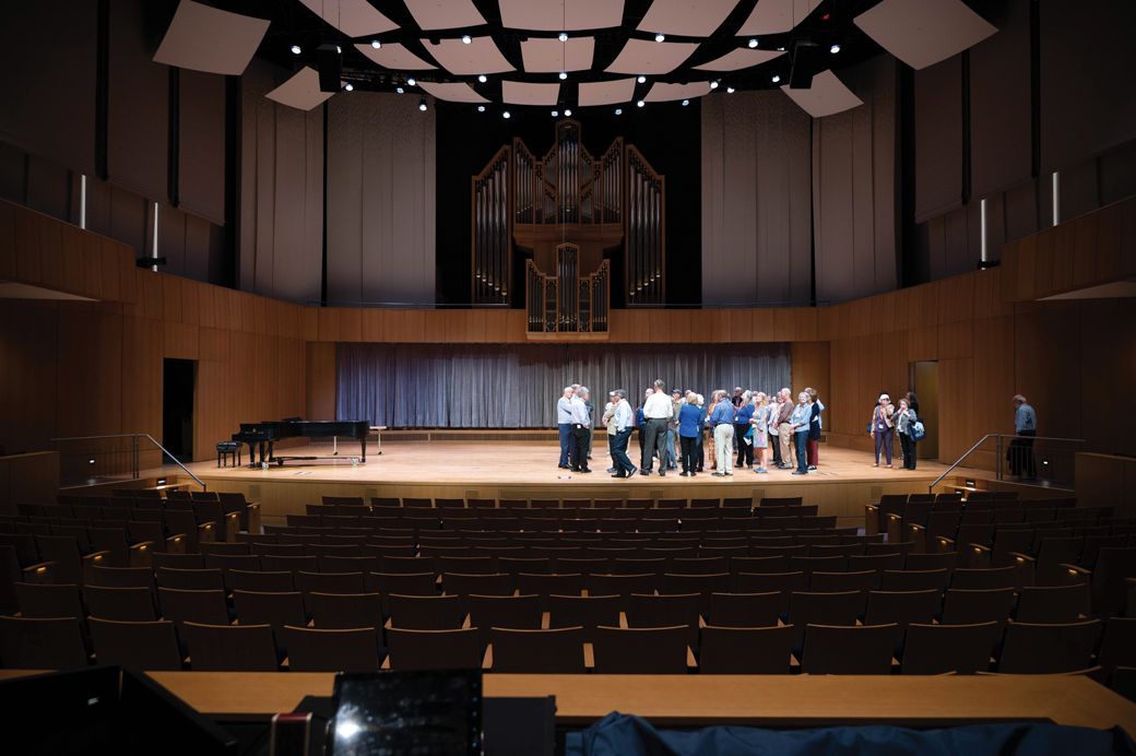 Alumni explore the Concert Hall in the new Armerding Center for Music & the Arts