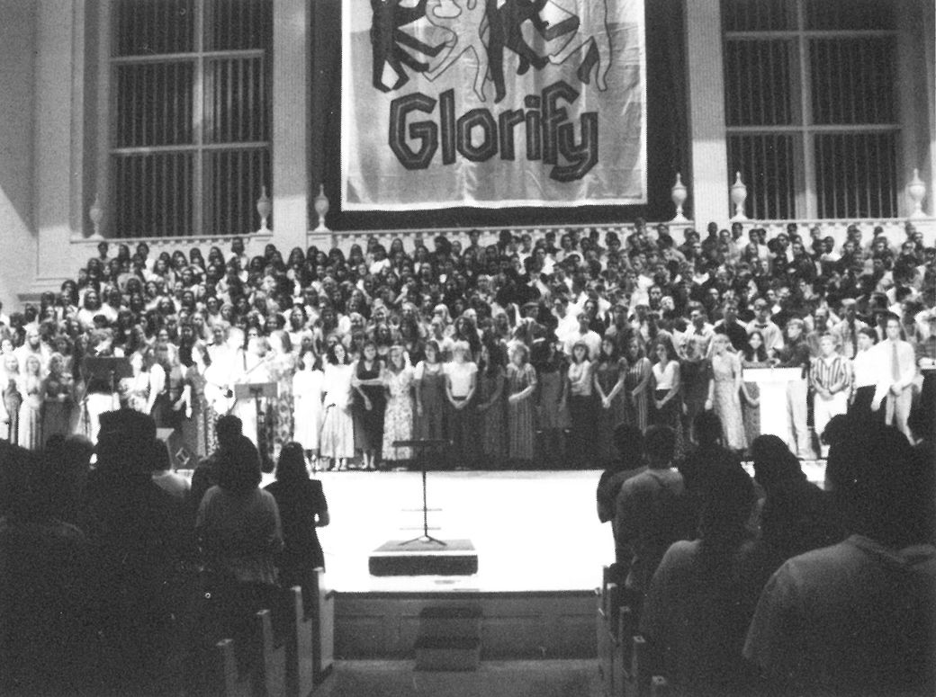 First-year students learn their class song at the first All-School Communion service of the academic year.