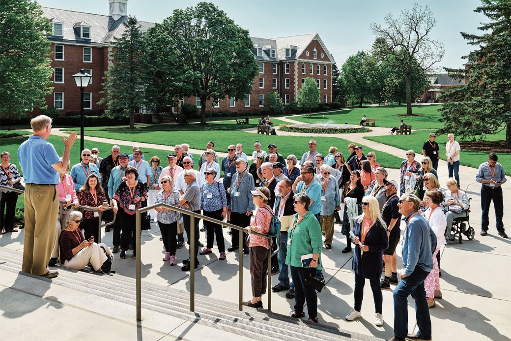 Retired Wheaton College architect Bruce Koenigsberg leads a tour of campus.
