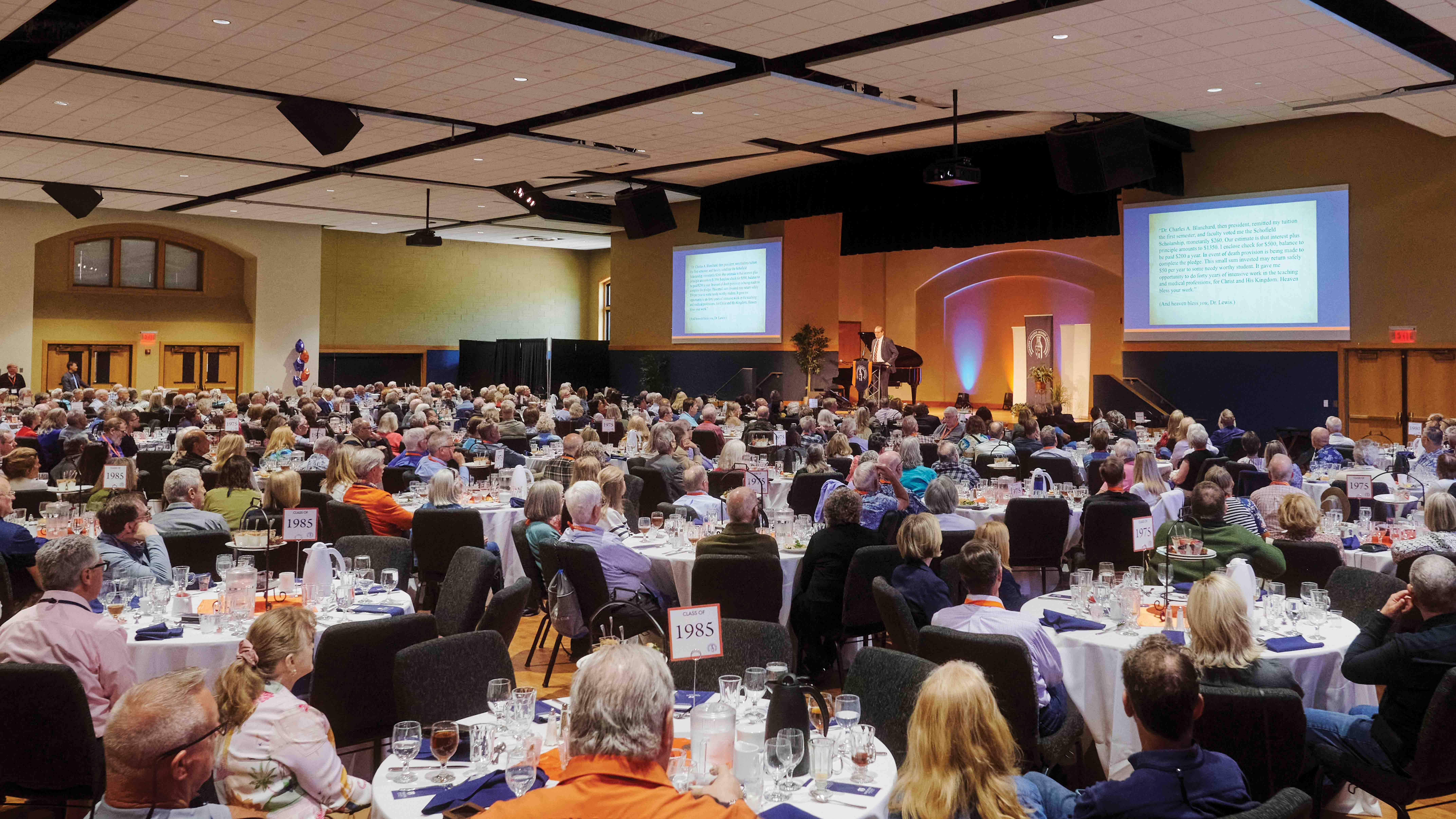 Wheaton Associates join reunion classes in Coray Alumni Gymnasium for lunch.