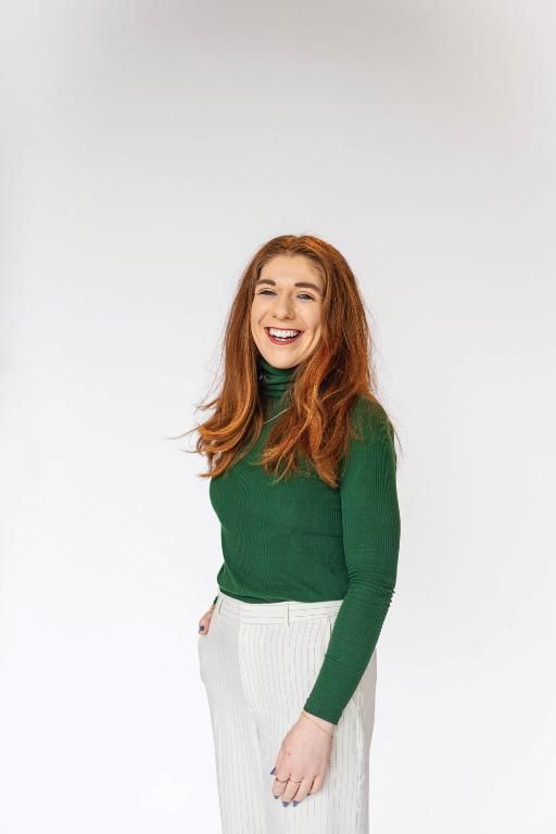 Wheaton College engineering professor Kelly Vazquez in a green sweater