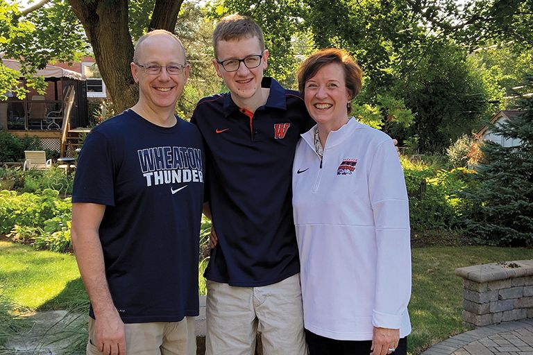 Justin Smith, a second-generation Wheaton student, with parents Andrew Smith ’91 and Renae Schauer Smith ’91.