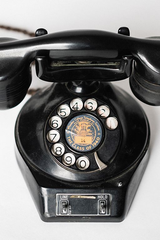 The class gift of the seniors of 1940 was an interoffice telephone system. President Edman’s office telephone, shown here, was part of that purchase.
In 1965, Ray Smith ’54, then editor of Telephone Engineer & Management and president of the
Wheaton College Alumni Association, dialed the first TouchTone phone call at
Wheaton to none
other than Billy
Graham.