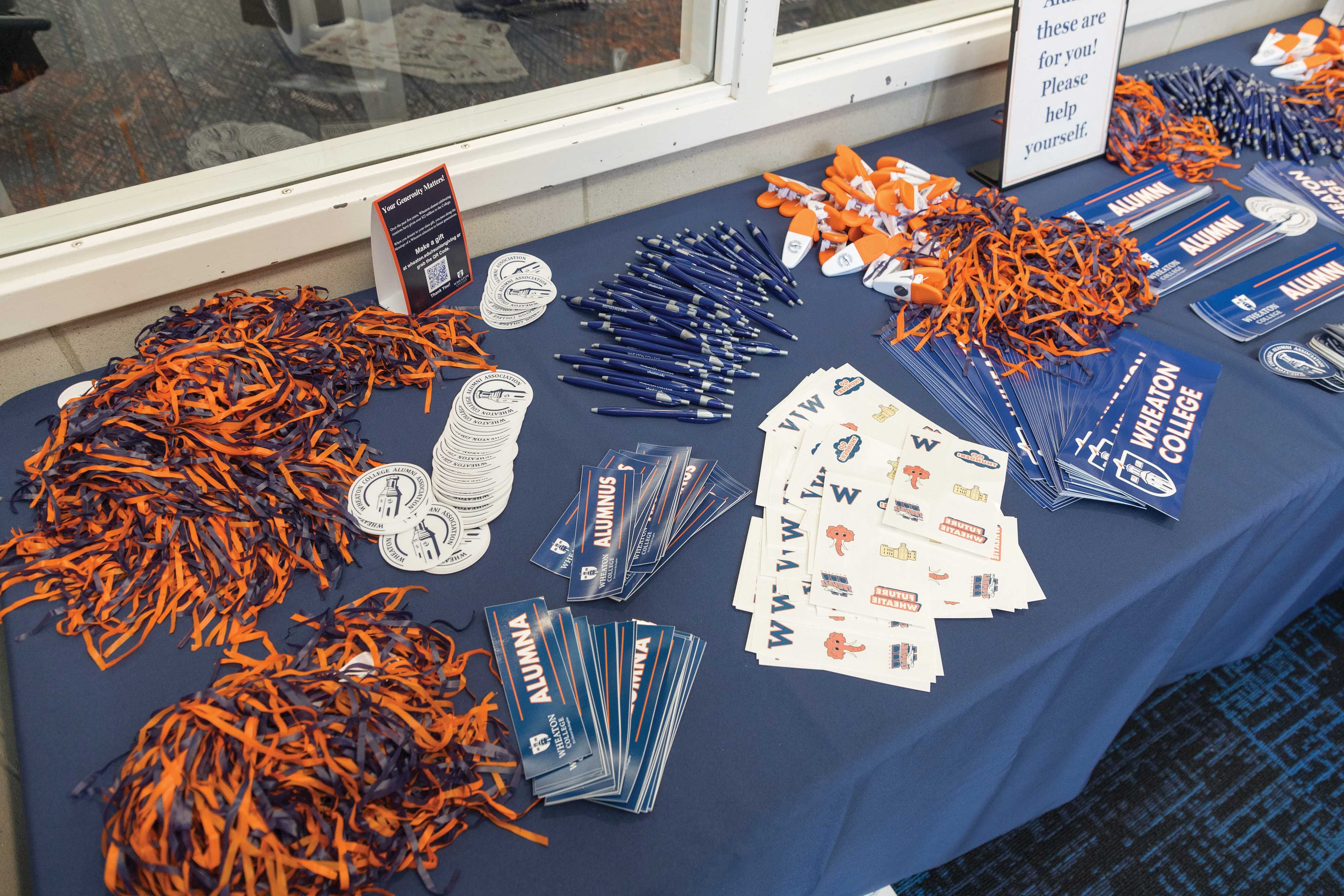 Free stickers, pens, books, and other memorabilia for Homecoming attendees.