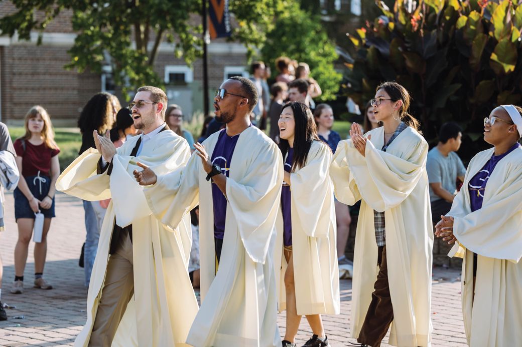 Wheaton College Gospel Choir members wearing one of their many different performance robes.