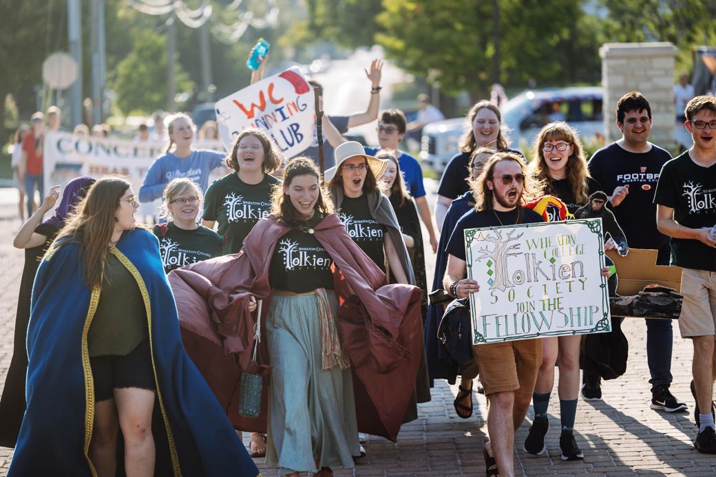 Members of the Tolkien Society don robes and club T-shirts.