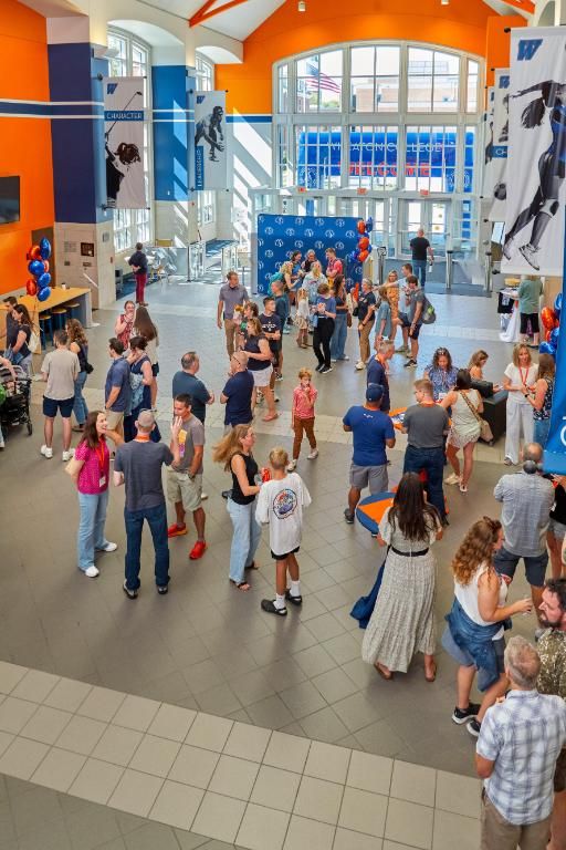 Alumni and families gathered at Reunion Check-In as the weekend got underway.