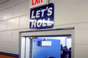 Let's Roll Sign from Wheaton Thunder Locker Room