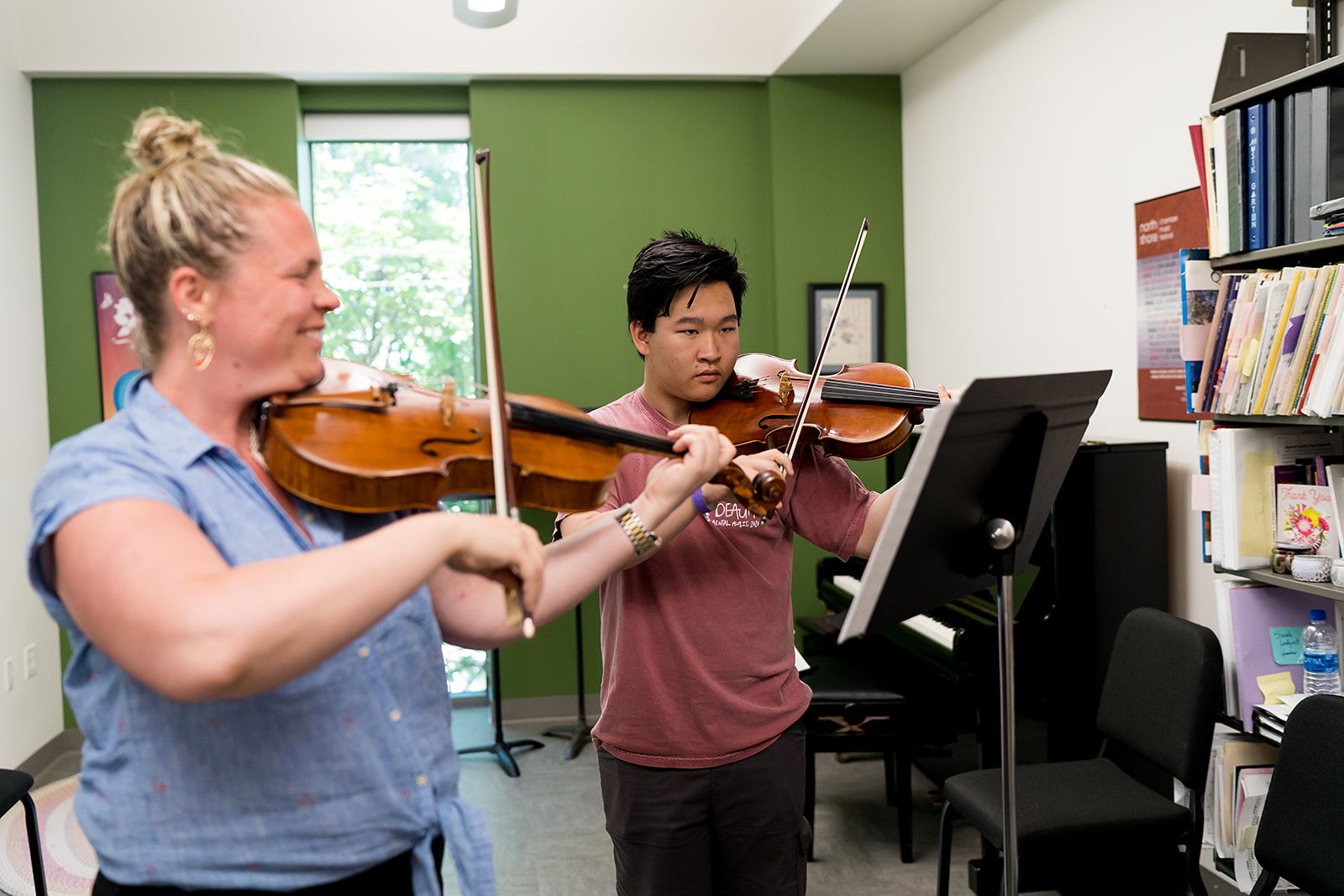 Wheaton College Summer Institute student and prof practicing viola