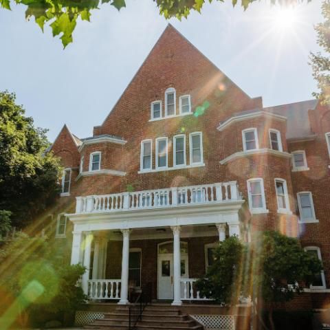 Williston Hall with sunbeams