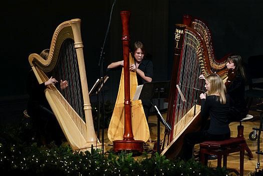 3 Harpists performing during the Christmas Festival Concert