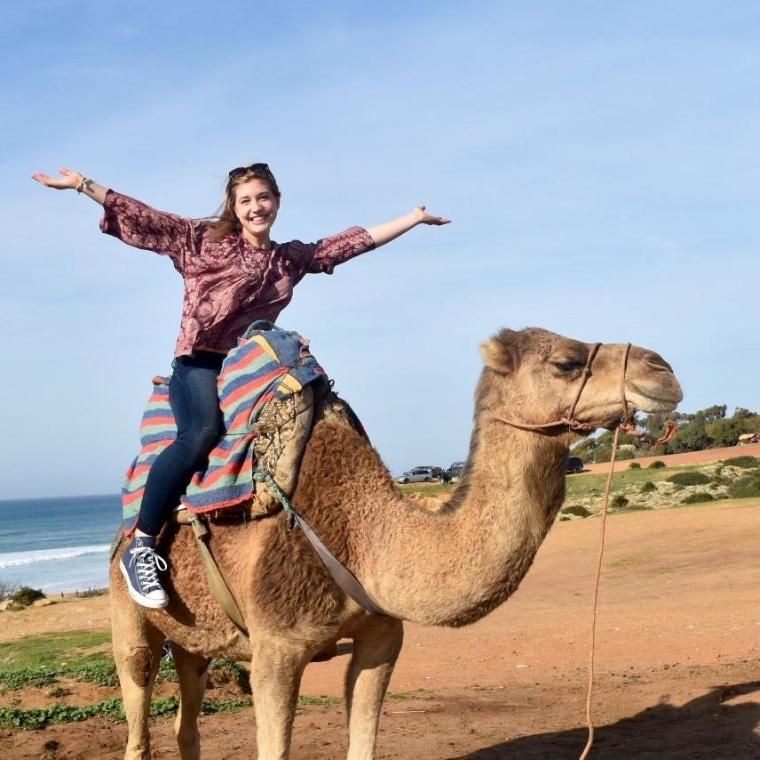 Wheaton College IL Student riding camel