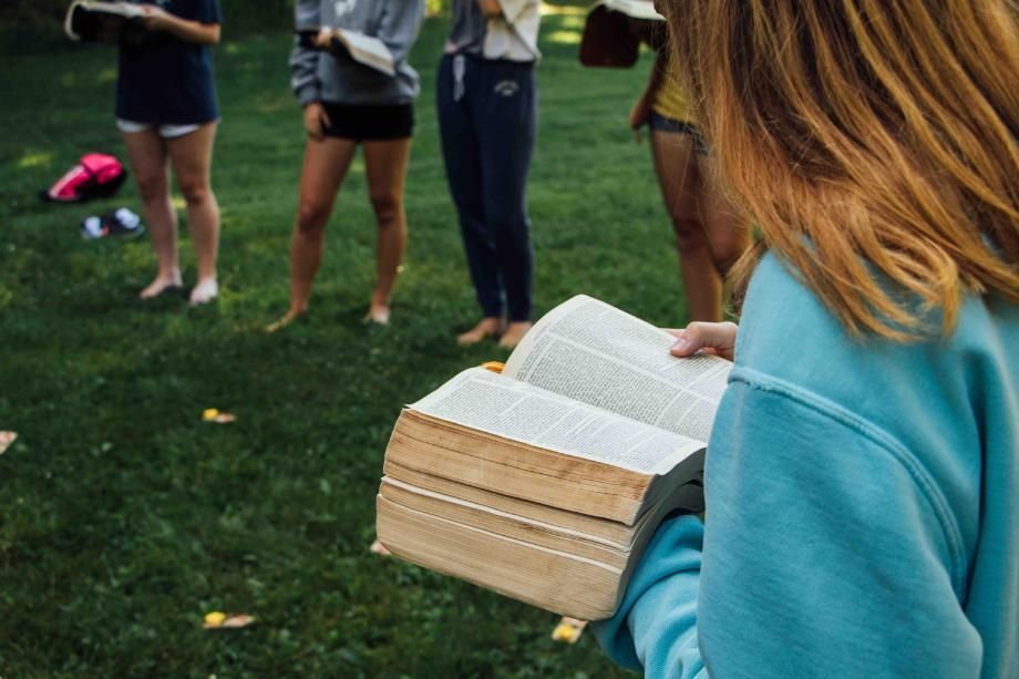 camper with bible at honeyrock