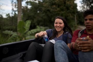 vanguard rides in truck with a local in the dominican republic on international trip