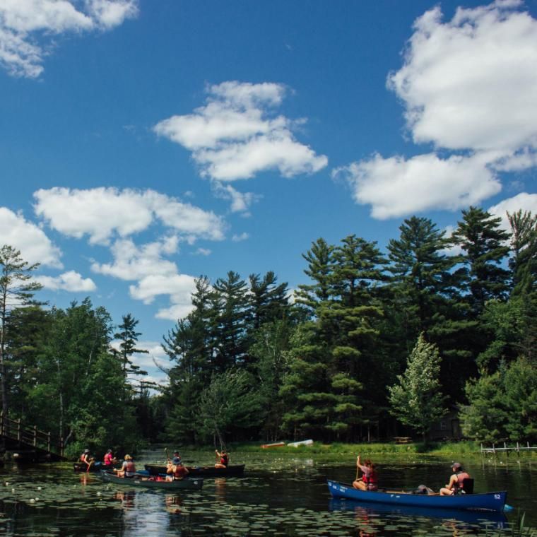 people canoeing in the lagoon