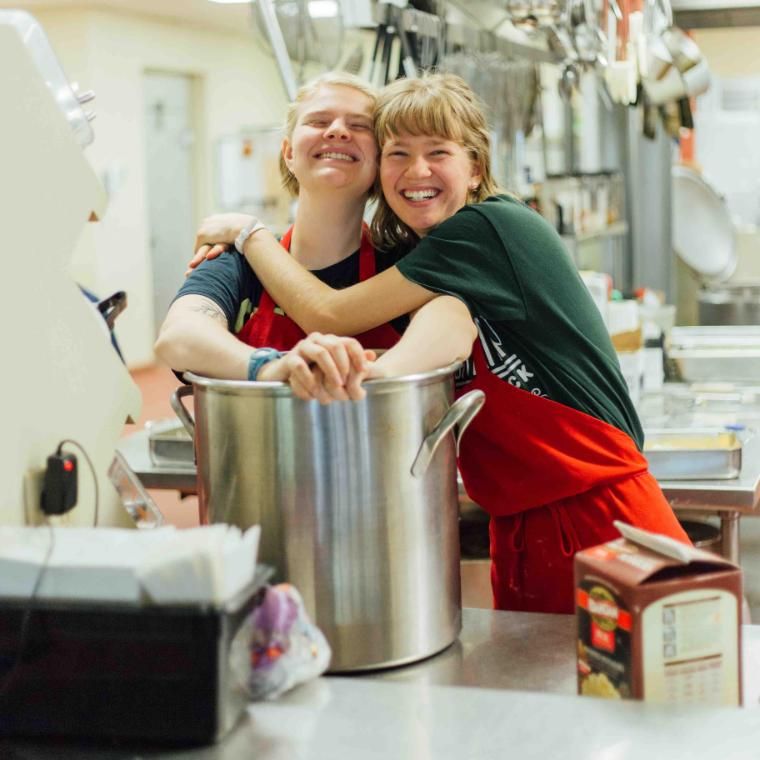 sisters working in the kitchen