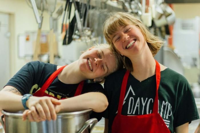 sisters working in the kitchen