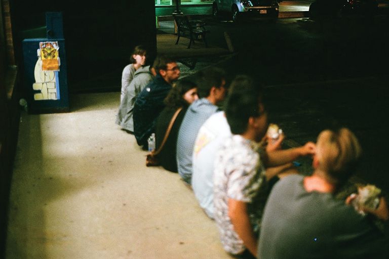 Fall transfer students outside of "Los" eating burritos during the first week of classes last year