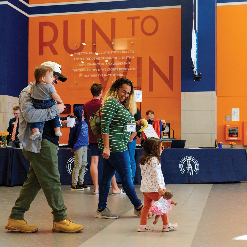 Families arrive for reunion check-in.