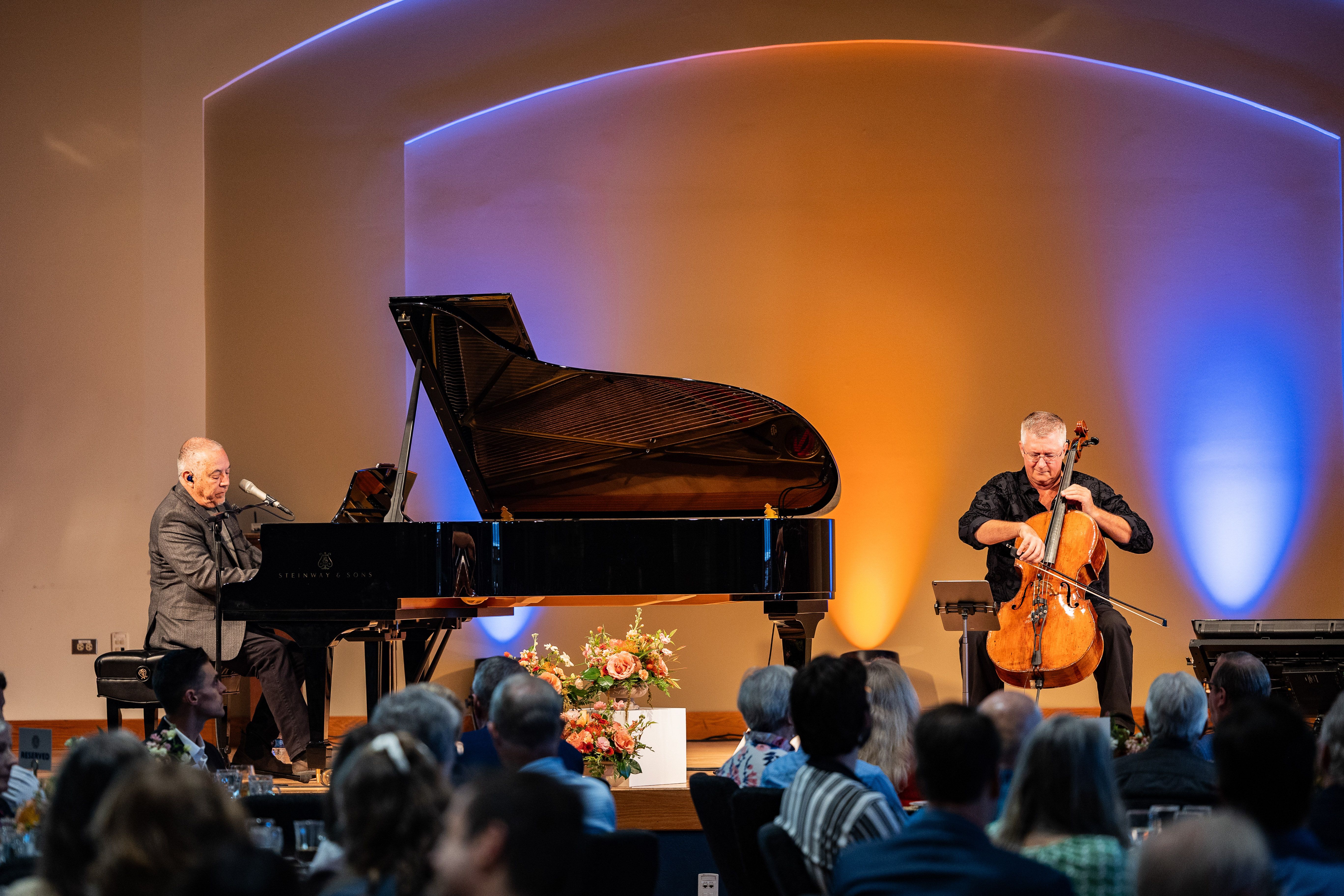 Fernando Ortega (piano, voice) and Cameron Stone (cello) perform at the Gratitude Breakfast.